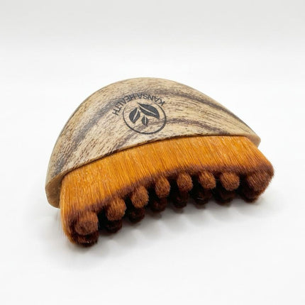 Close-up of Kansa Health lymphatic body brush
