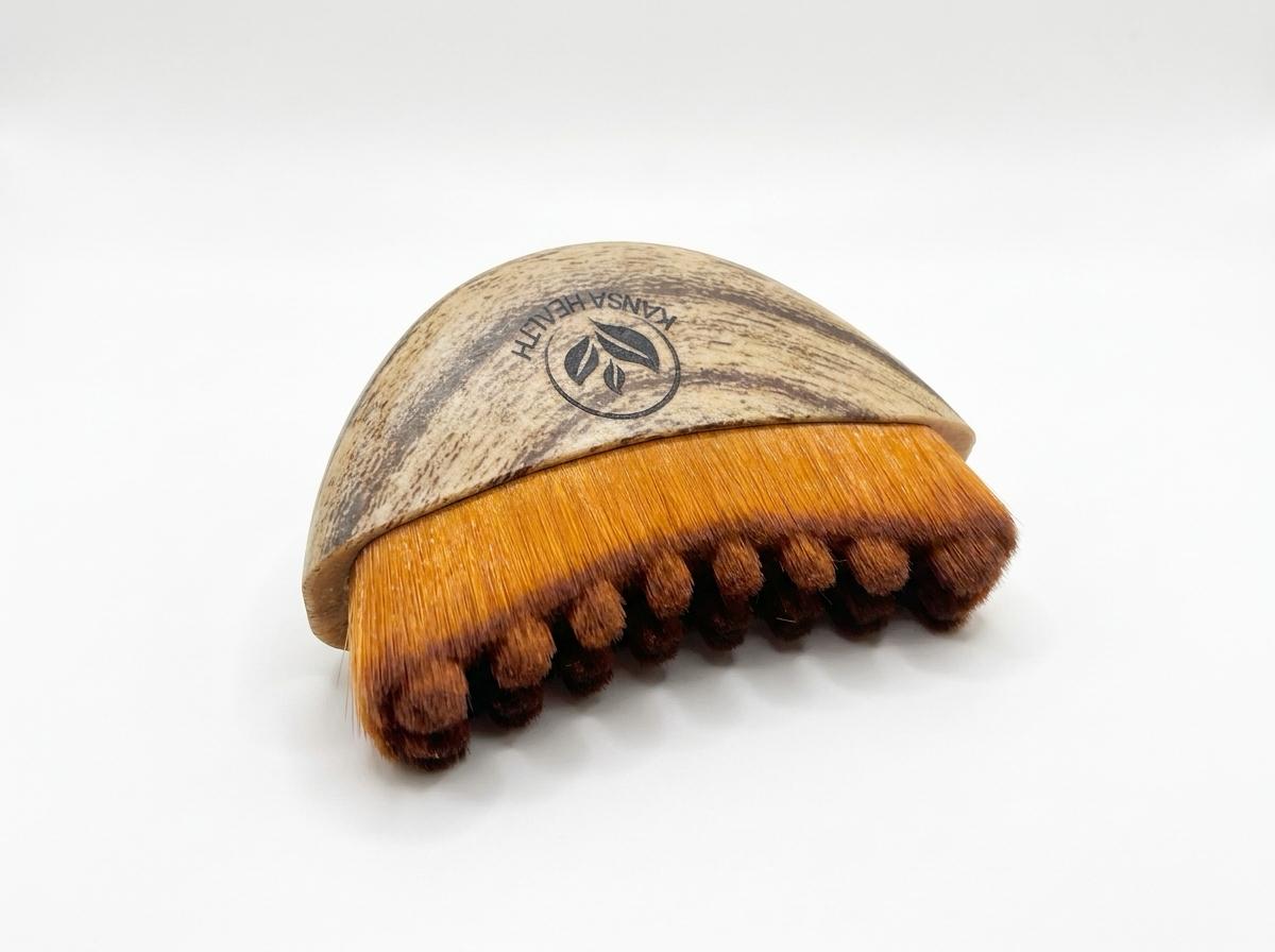 Close-up of Kansa Health lymphatic body brush