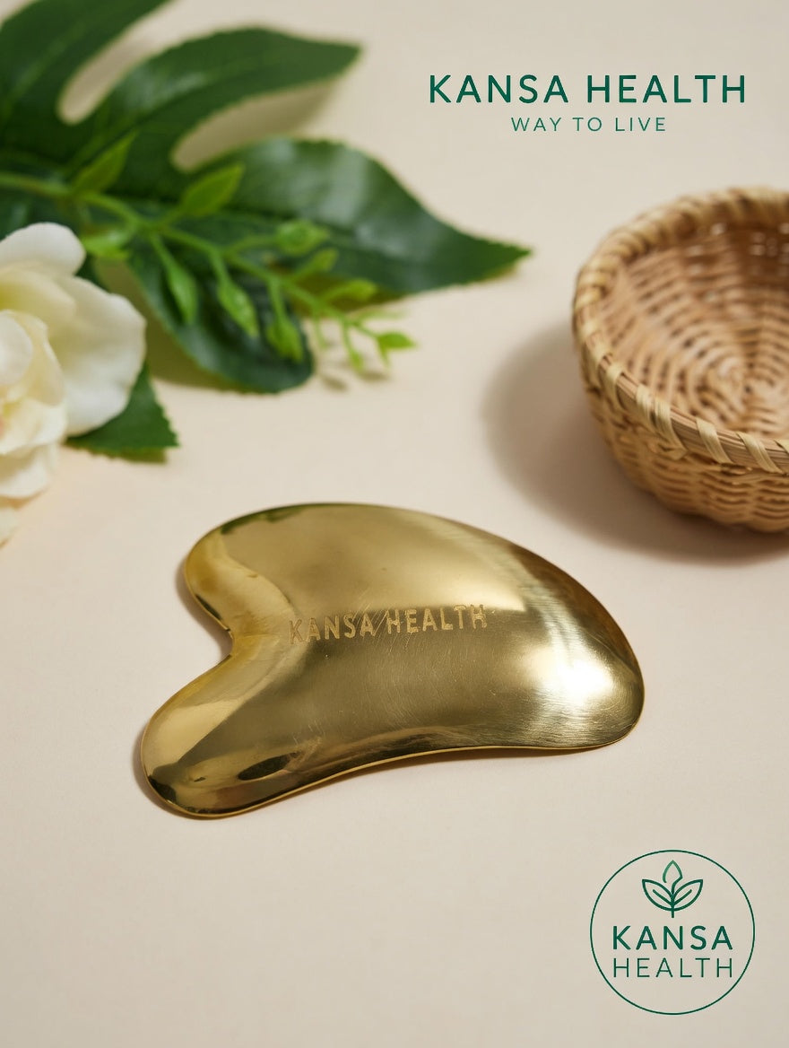 Kansa gua sha facial tool sculpting jawline and cheek contours