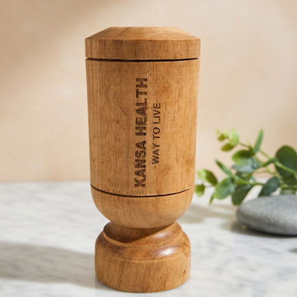 Morning routine drinking Vijaysar infused water from wooden tumbler