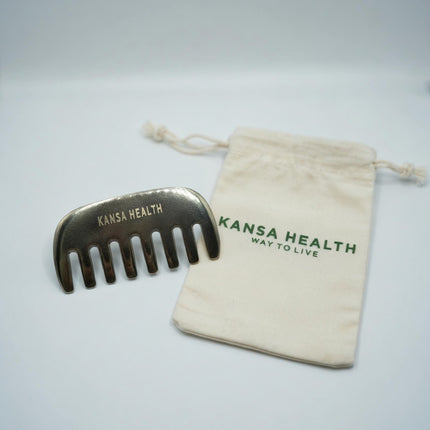 Woman using Kansa bronze scalp massager comb for relaxing head massage