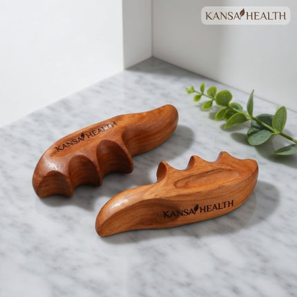 close‑up of ergonomic wooden thumb massage tool groove for thumb support